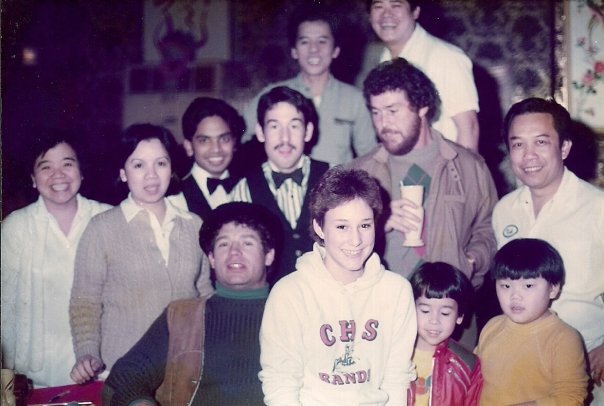 That's me (in yellow) and my family posing with John Riggins